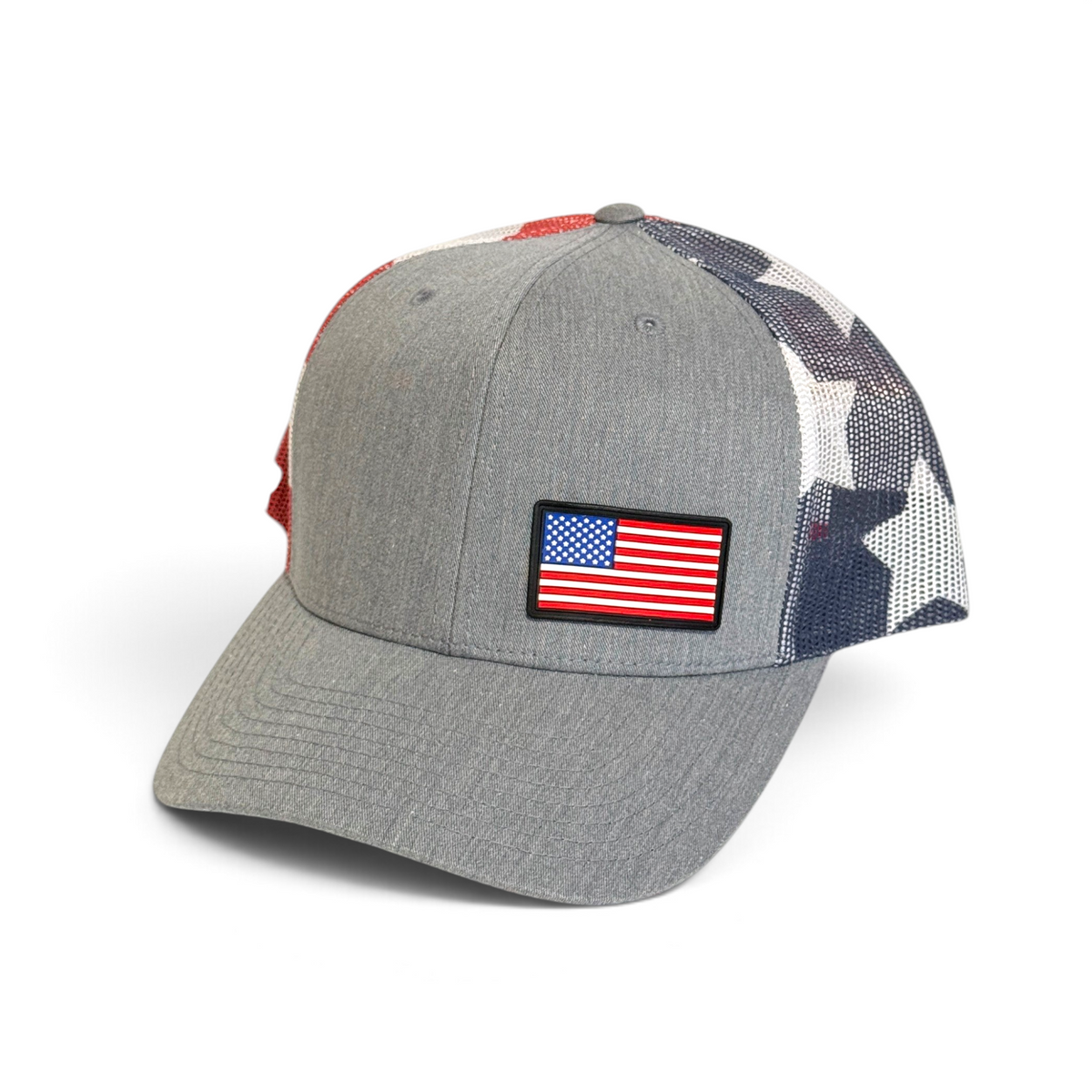 Crafted Merch grey trucker hat featuring a full-color American flag PVC patch and a patriotic star-patterned mesh back