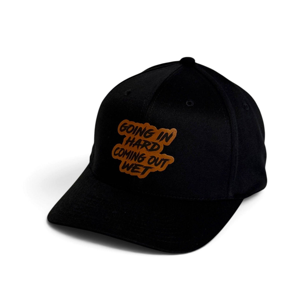 Crafted Merch black baseball cap featuring a brown patch with the text Going In Hard Coming Out Wet