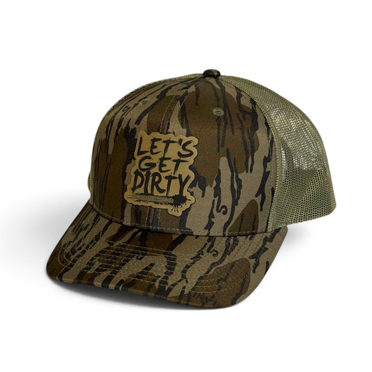 Crafted Merch Let's Get Dirty patch hat in camouflage print with olive green mesh back and adjustable snapback closure.